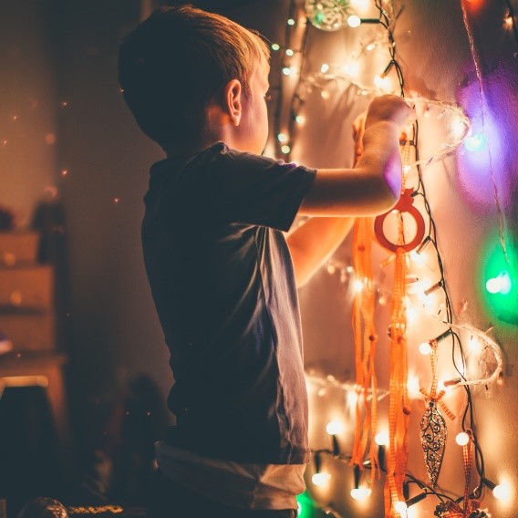 A child hanging decorations
