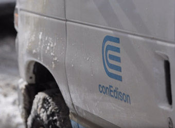 Con Edison Van with close-up of Con Edison logo.