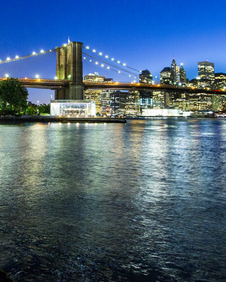 A night view of Brooklyn Bridge, and the East River