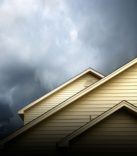 storm clouds above house