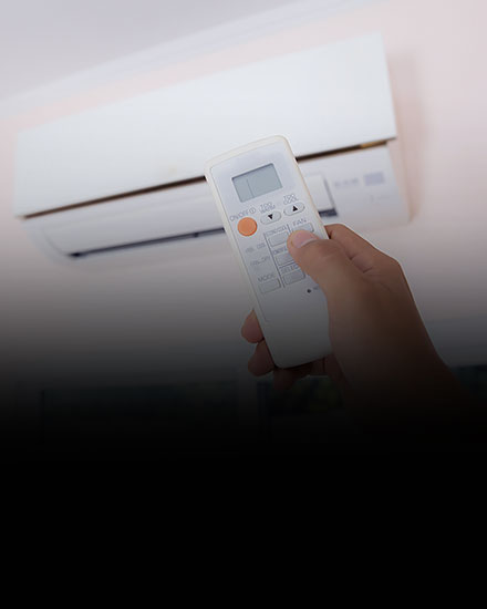 ductless mini split being controlled with remote