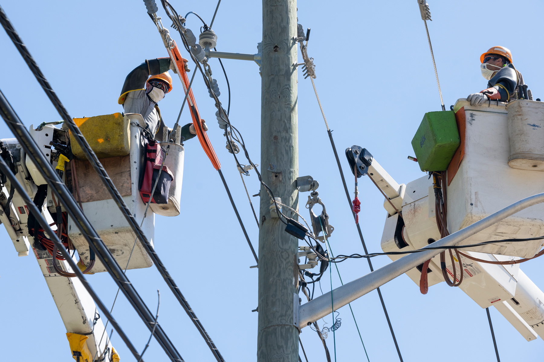 O&R overhead line technicians at work on a storm hardening project. 