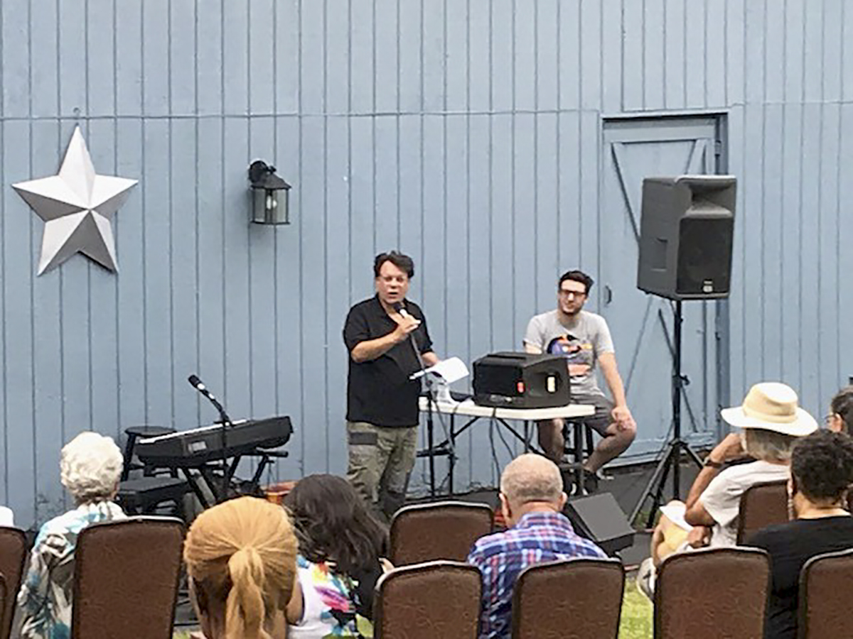 Penguin Repertory Theater Founding Artistic Director Joe Brancato, left, welcomes patrons to the inaugural performance of the Penguin’s summer music festival Barnside Live @ 5! last Saturday evening on the lawn of the historic theater in Stony Point. 